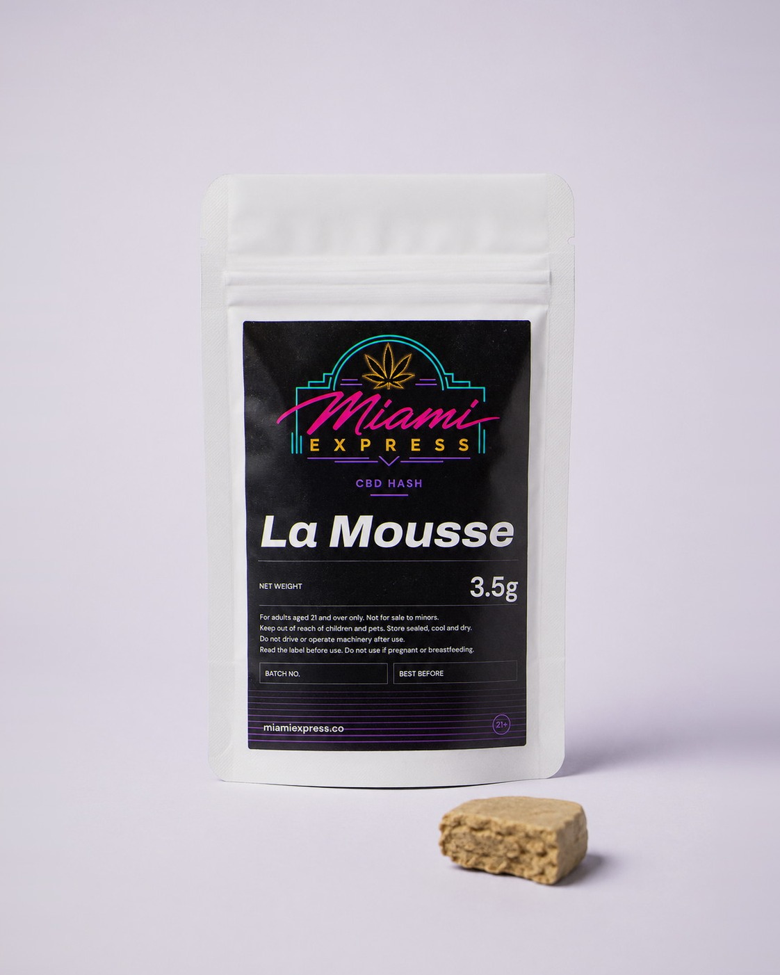 La Mousse CBD Hash front view, white resealable bag on a pale lilac studio background