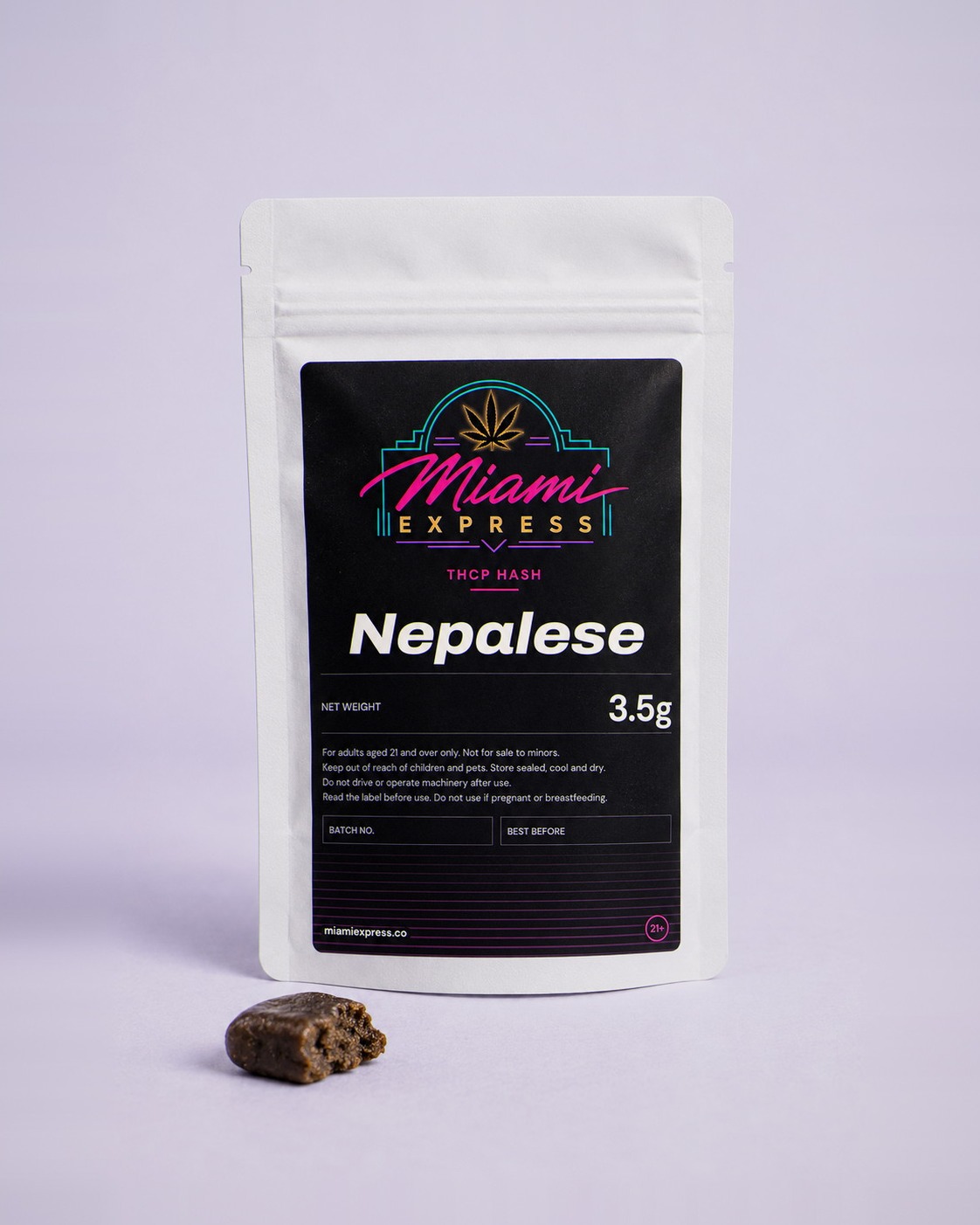 Nepalese THCP Hash front view, white resealable bag on a pale lilac studio background
