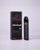OG Kush THCP Vape front view, matte black box and CCELL Easy Bar device on a pale lilac studio background